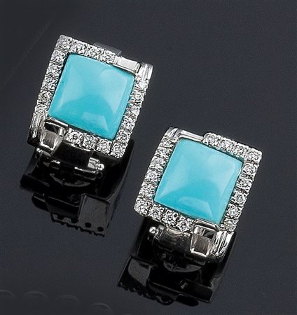 COPPIA DI ORECCHINI Coppia di orecchini in oro bianco, a lobo, di forma...