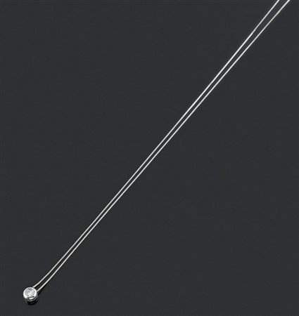 PUNTO LUCE Punto luce in oro bianco con diamante solitario taglio brillante...