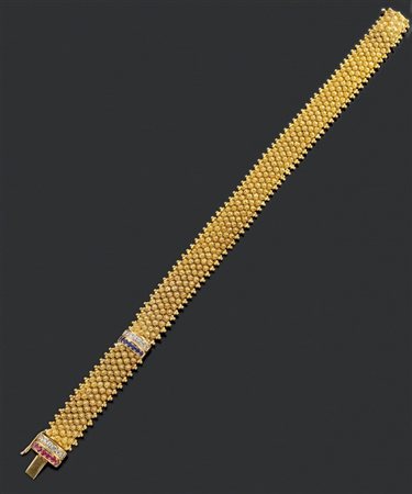 BRACCIALE Bracciale in oro giallo 22 Kt lavorato a motivi di fiori...