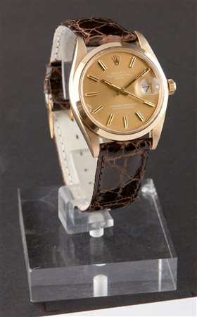 ROLEX Oyster Perpetual Date, ref. 1500, anno 1975 Diam 34 Cassa oyster in oro...