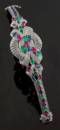 BRACCIALE Bracciale in oro bianco, lavorato a motivo di volute vegetali,...