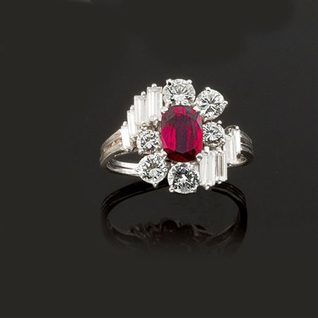 ANELLO Anello in oro bianco con al centro rubino taglio ovale di ct 1,50 ca e...