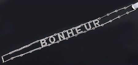 BRACCIALE Bracciale in oro bianco, a bassa caratura,nella parte centrale reca...