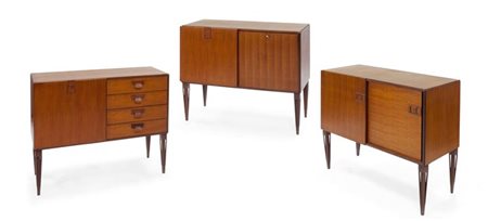 CREDENZE Tre credenzine in legno di teak con cassetti, ribaltine e sportelli....