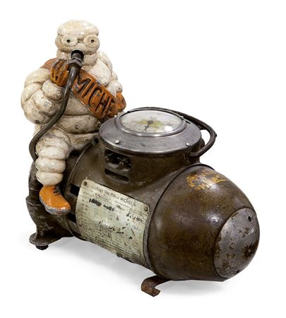 MICHELIN Compressore pubblicitario in fusione d'alluminio con Bibendum seduto...