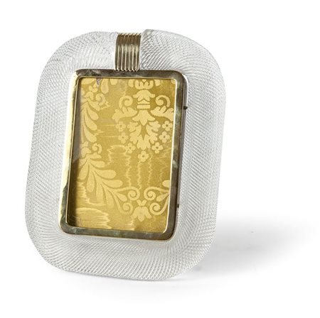 BAROVIER & TOSO Cornice in vetro massiccio trasparente con superficie rigata....