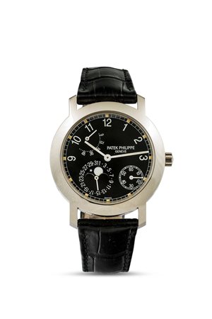 PATEK PHILIPPE - ref. 5055G-001, Raro orologio con riserva di carica, fasi lunari e calendario. Scatola e Garanzia