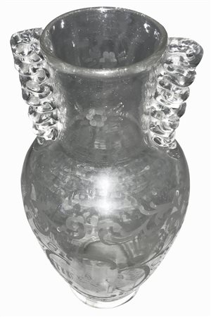 Toso Ferro. Anni ‘20. Vaso in vetro trasparente a forma di balaustra. anse a...