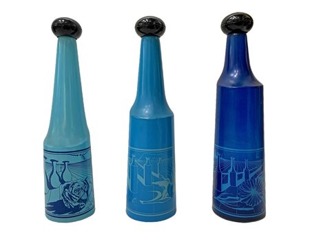 Trio di bottiglie serigrafate Salvador Dalì per Rosso Antico 1970.
