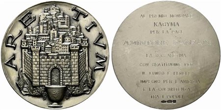 <br>AREZZO. Medaglia al premio mondiale Kagyma per la pace Amintore Fanfani. D/ARETIVM; veduta della città di Arezzo. Ag (247 g - 79,8 mm). FDC