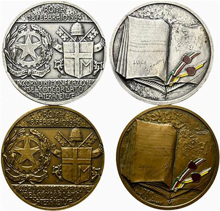 <br>ROMA. Coppia di medaglie 1984 Accordo di modificazione del Concordato Lateranense (AE con smalti 134 g - 69,7 mm + Ag con smalti 161 g - 70 mm). Opus Soccorsi-Colaneri. FDC