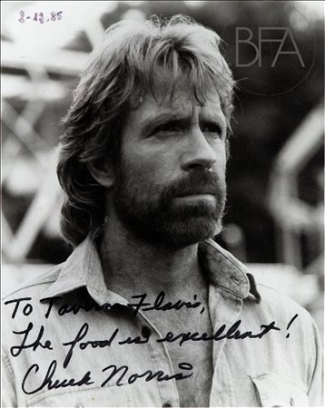  Portrait of Chuck Norris with autograph and dedication.