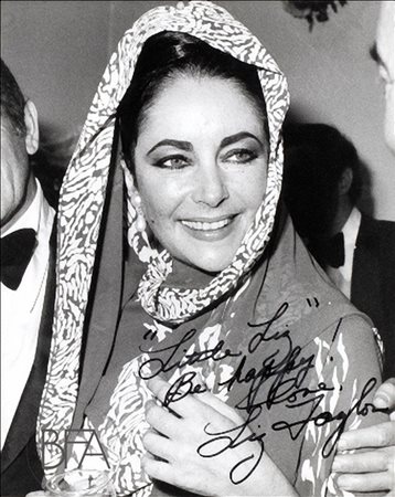 A. Foster Signed portrait of Elizabeth Taylor.