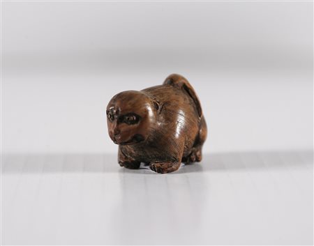 MANIFATTURA GIAPPONESE DEL XIX SECOLO Netsuké raffigurante un animale con un...