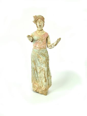 STATUETTA VOTIVA DI OFFERENTE DATAZIONE: IV-III sec. a. C. MATERIA E TECNICA:...