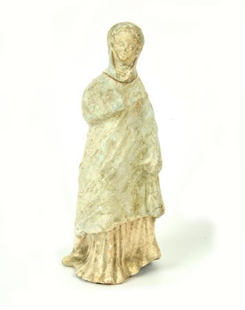 STATUETTA VOTIVA DATAZIONE: IV-III sec. a. C. MATERIA E TECNICA: argilla...