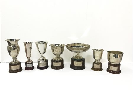 Eight silver cups, gr. 477 ca. Golf Club. 20th c.