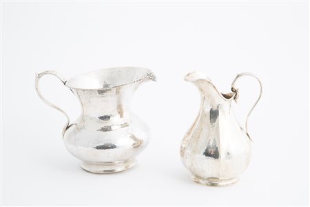 Two 800 silver pourers, gr. 980 ca. 20th c.