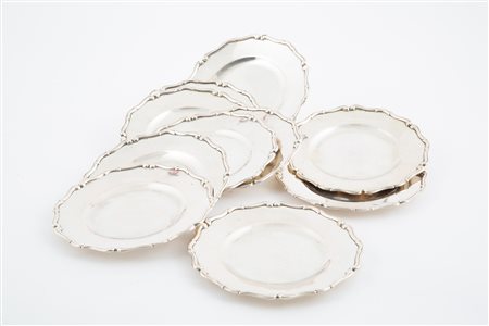 Ten small 800 silver plates, gr. 1200 ca. 20th c.