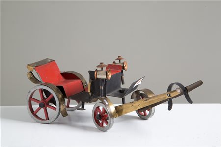 Metal and brass carriage. 20th century