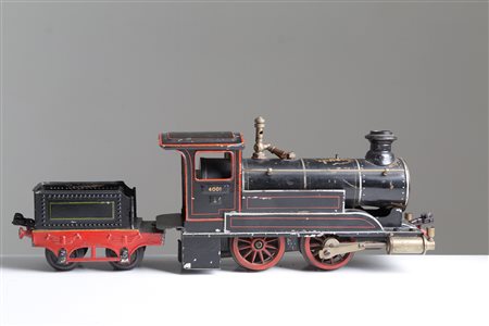 Train in metal sheet and iron. 20th century