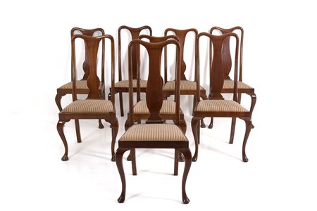 Eight wooden chairs. England. Early 20th century