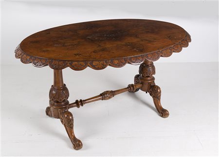 Wooden living room table. England. 19th century