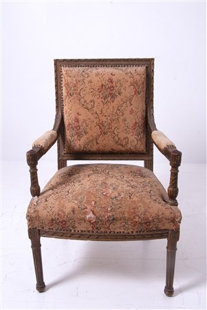 Wooden and fabric armchair. 19th century