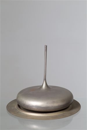 Metal centrepiece on a plate. Italy. 1960s