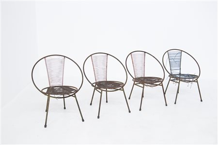 Four iron and plastic armchairs. Italy. 1950s