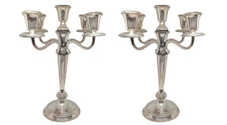 Coppia di candelieri in argento