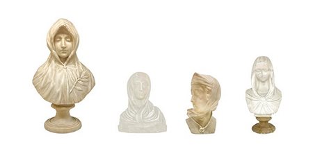 Gruppo di n. 4 mezzi busti in marmo bianco