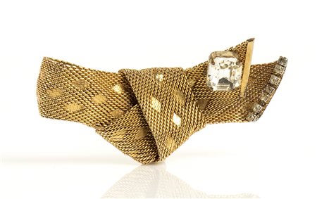 CHRISTIAN DIOR
SPILLA IN METALLO DORATO
1964