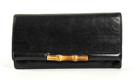 GUCCI
PORTAFOGLIO IN PELLE
Anni ‘90