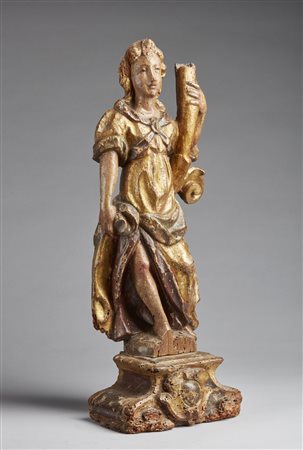  SCULTORE DELL'ITALIA SETTENTRIONALE DEL XVII SECOLO - Scultura in legno policromo e parzialmente dorato raffigurante figura con cornucopia.