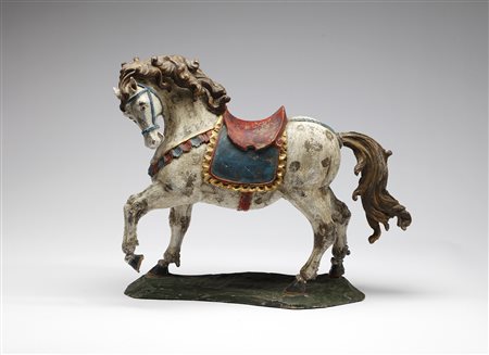 ARTISTA DEL XVIII SECOLO  - Cavallo in legno policromo.