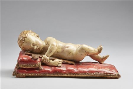  PLASTICATORE ITALIANO DEL XIX SECOLO - Scultura in terracotta policroma raffigurante Gesù Bambino dormiente.