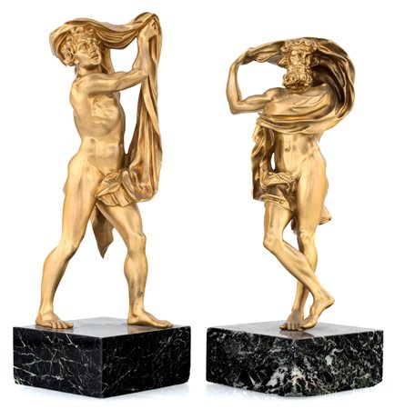 Due sculture in bronzo dorato, XIX secolo raffiguranti nudi virili ritratti...