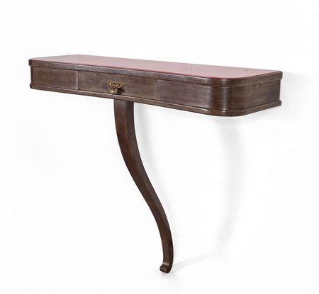  UNA CONSOLE, anni "50. <br>Legno di noce, 