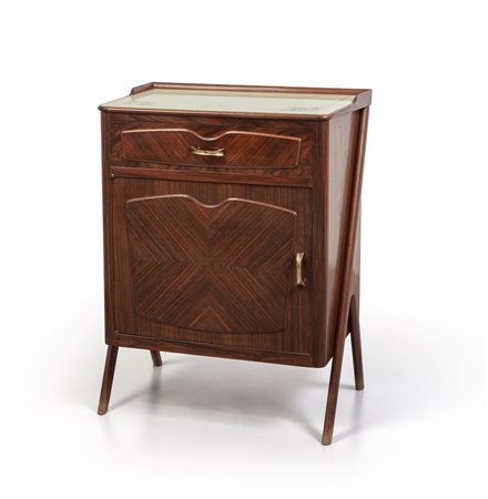 UN COMODINO, anni "50. <br>Legno di palissandro, 