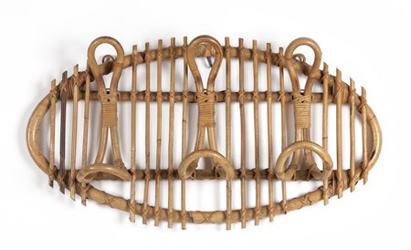 UN APPENDIABITI DA PARETE, anni "60. <br>Malacca, 