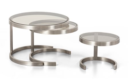 TRE TAVOLINI COMPONIBILI, anni "70. <br>Acciaio 