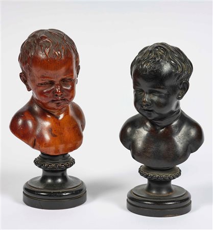 Due busti di fanciullo in legno scolpito e bronzo fuso. Arte italiana del XIX...