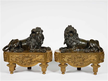 Coppia di alari da camino in bronzo dorato e patinato. XIX secolo...