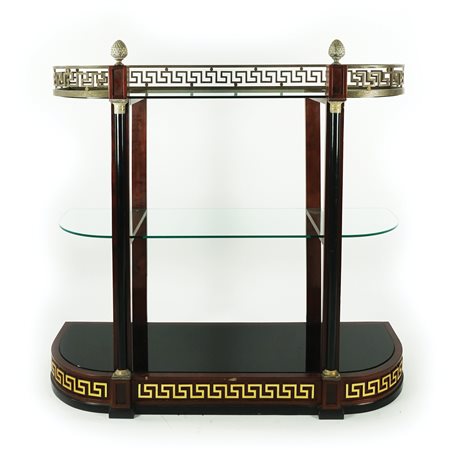 Console in mogano; montanti anteriori lineari abbelliti da semicolonne...