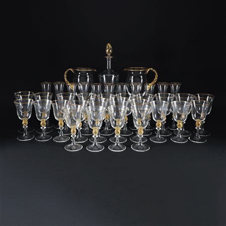 Servizio di bicchieri in vetro incolore in parte a inclusioni dorate,...