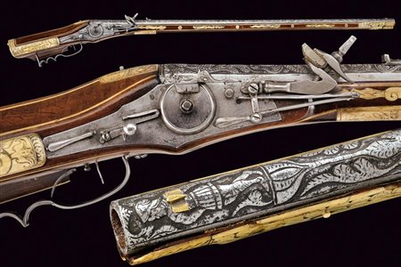 Bel fucile a ruota con canna intagliata