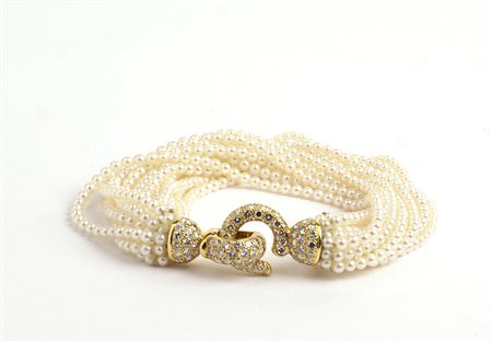 BRACCIALE firmato e numerato Cartier composto da quindici fili di piccole...