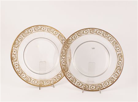 DODICI SOTTOPIATTI IN VETRO CON PROFILO DORATO d. 32 cm.
