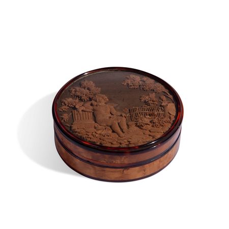 Scatola tonda in legno di radica e tartaruga con bassorilievo di Giuseppe Bonzanigo
